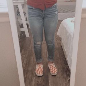 Ripped blue Levi jeans